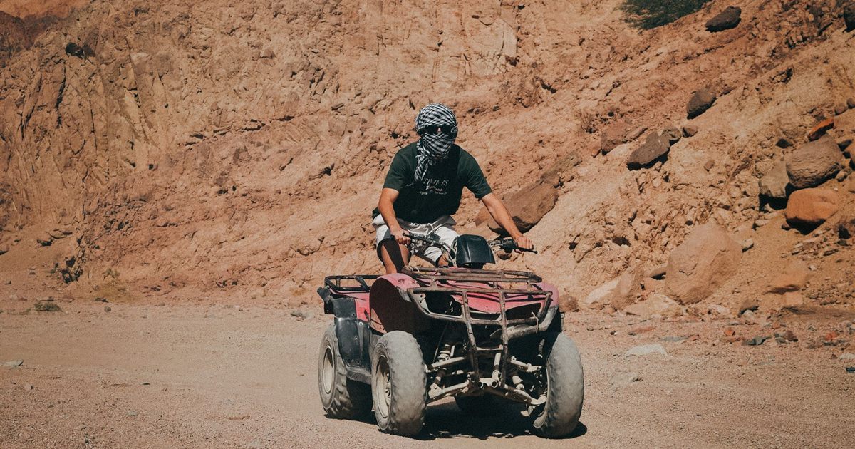 Quad bike rider on a desert track